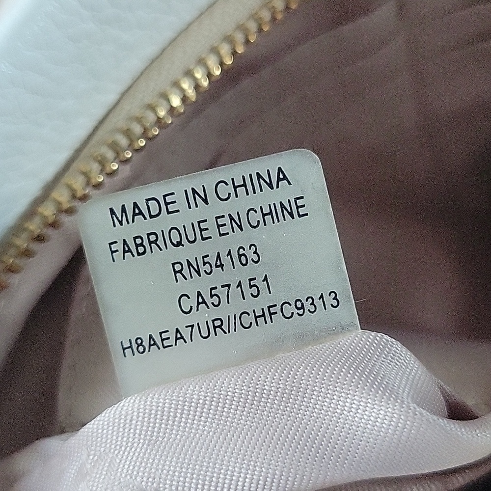 Calvin Klein Tan and White Crossbody Bag with Sleek Design - Picture 13 of 13